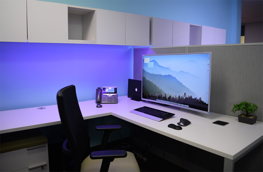 ALT Consulting private workspace with 4K monitor and MacBook Pro