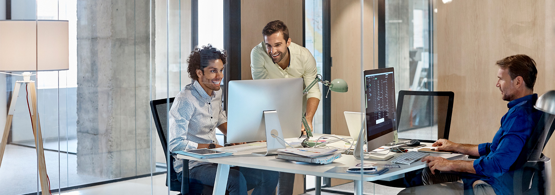 The ALT Consulting team working together in the office