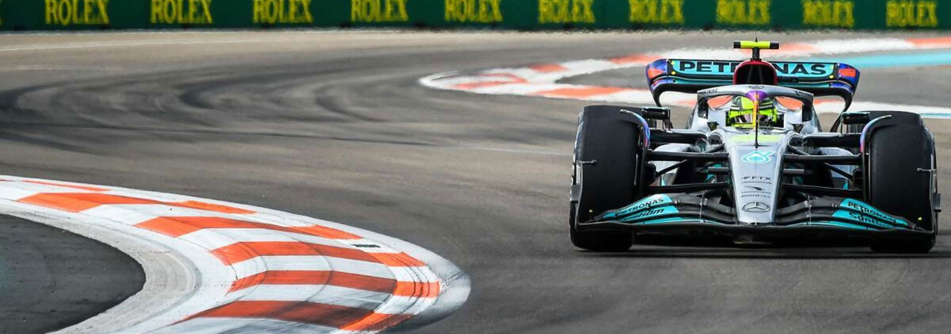 Formula 1 car cornering on a race circuit