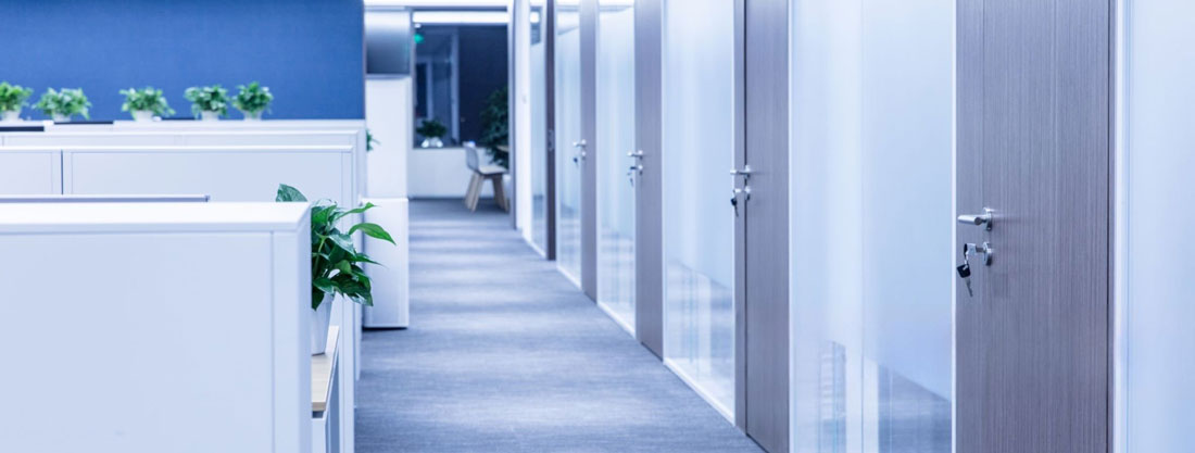 Office corridor representing an organized, well-run firm